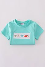 Load image into Gallery viewer, Blue marine creature embroidery smocked top