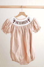 Load image into Gallery viewer, Khaki he is risen hand-smocked girl bubble