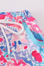 Load image into Gallery viewer, Tropical Sunset Waves swim trunks

