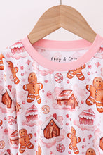 Load image into Gallery viewer, Pink gingerbread house bamboo pajmas romper
